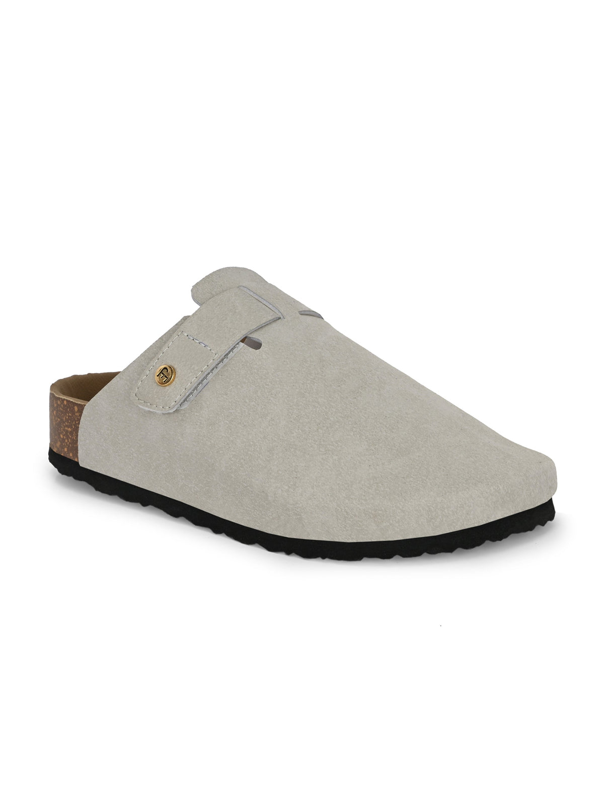 Nude suede slip-on clog with a black rubber sole and adjustable strap.