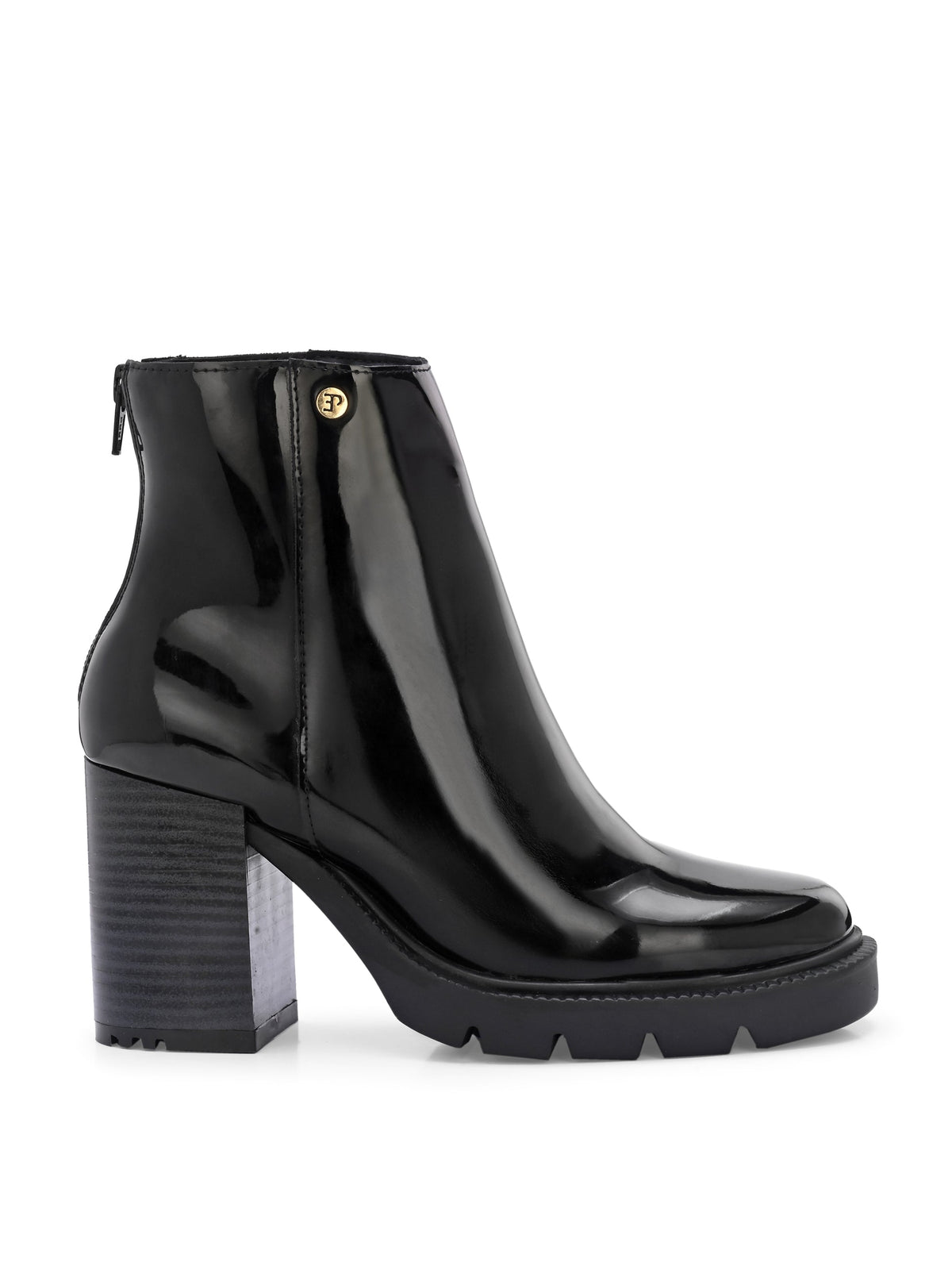 Glossy black patent leather ankle boot with a chunky block heel, lug sole, and a gold logo detail near the collar.