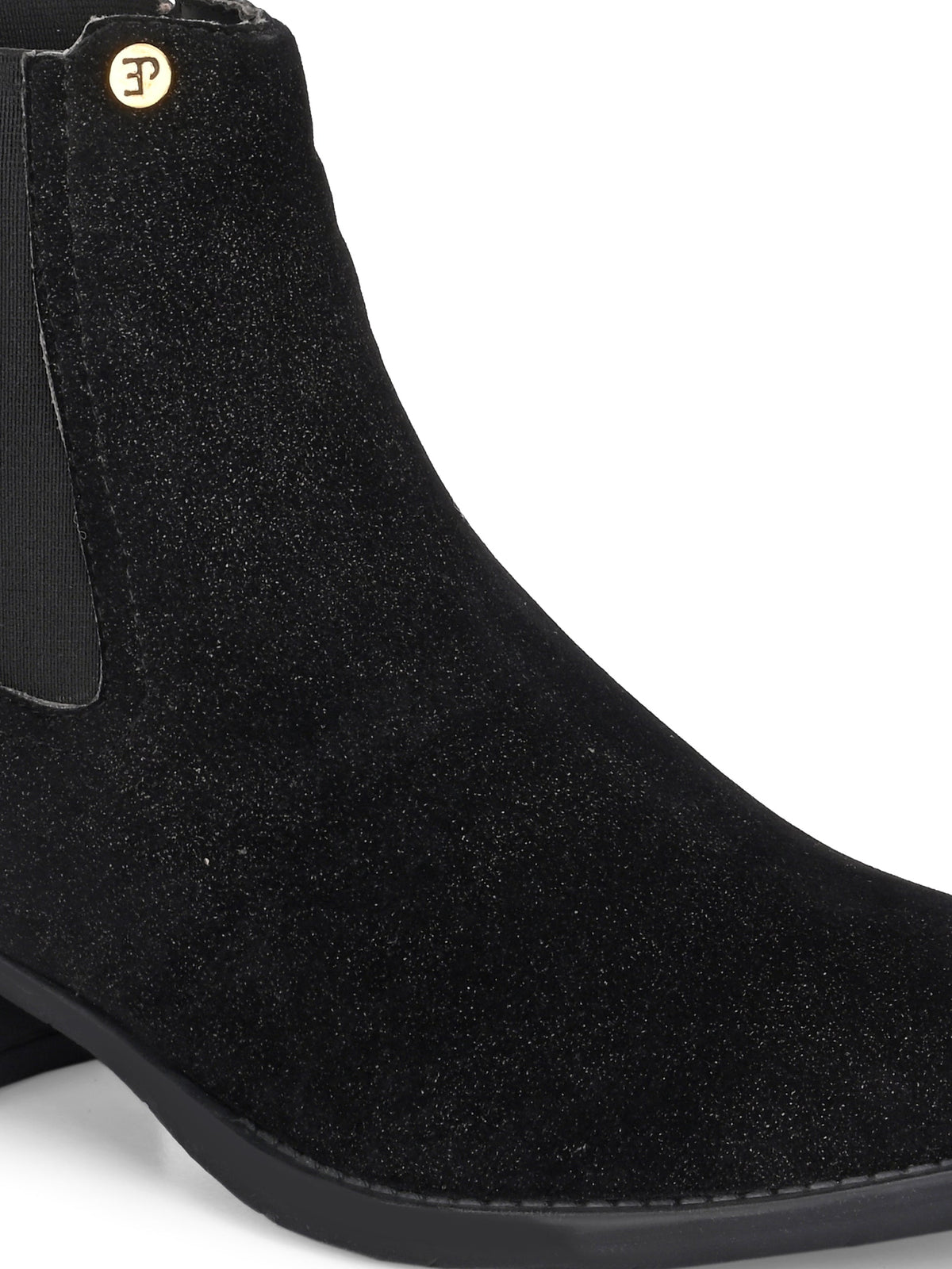 Charcoal suede slip-on boots with elastic side panels and a low block heel, featuring subtle gold detailing for a sleek, versatile look