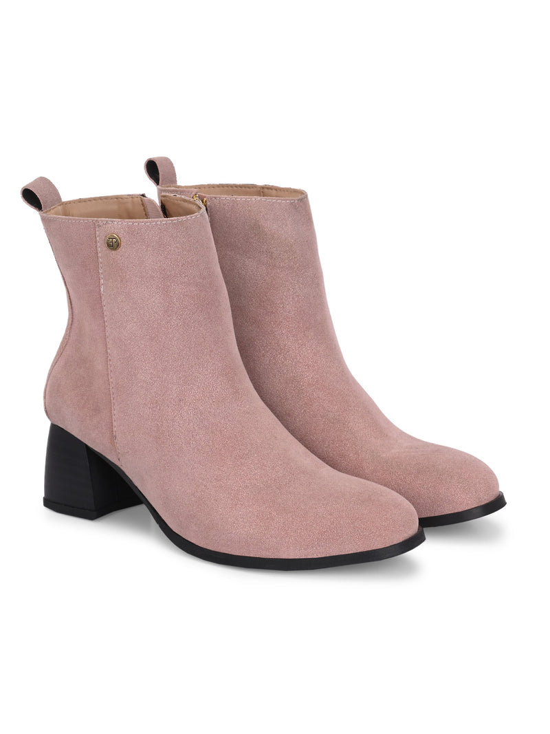 Light pink Suede ankle boots for women with a block heel and a sleek, minimalist design.