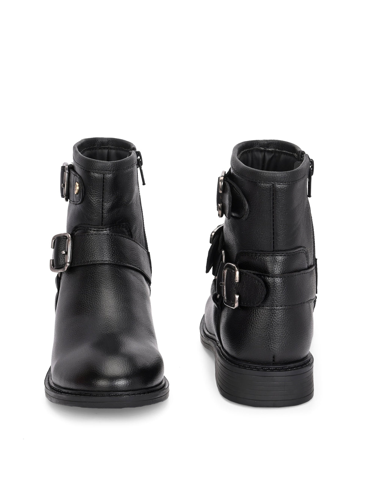 Black boots with silver buckle accents and a low heel, perfect for casual or semi-formal wear.