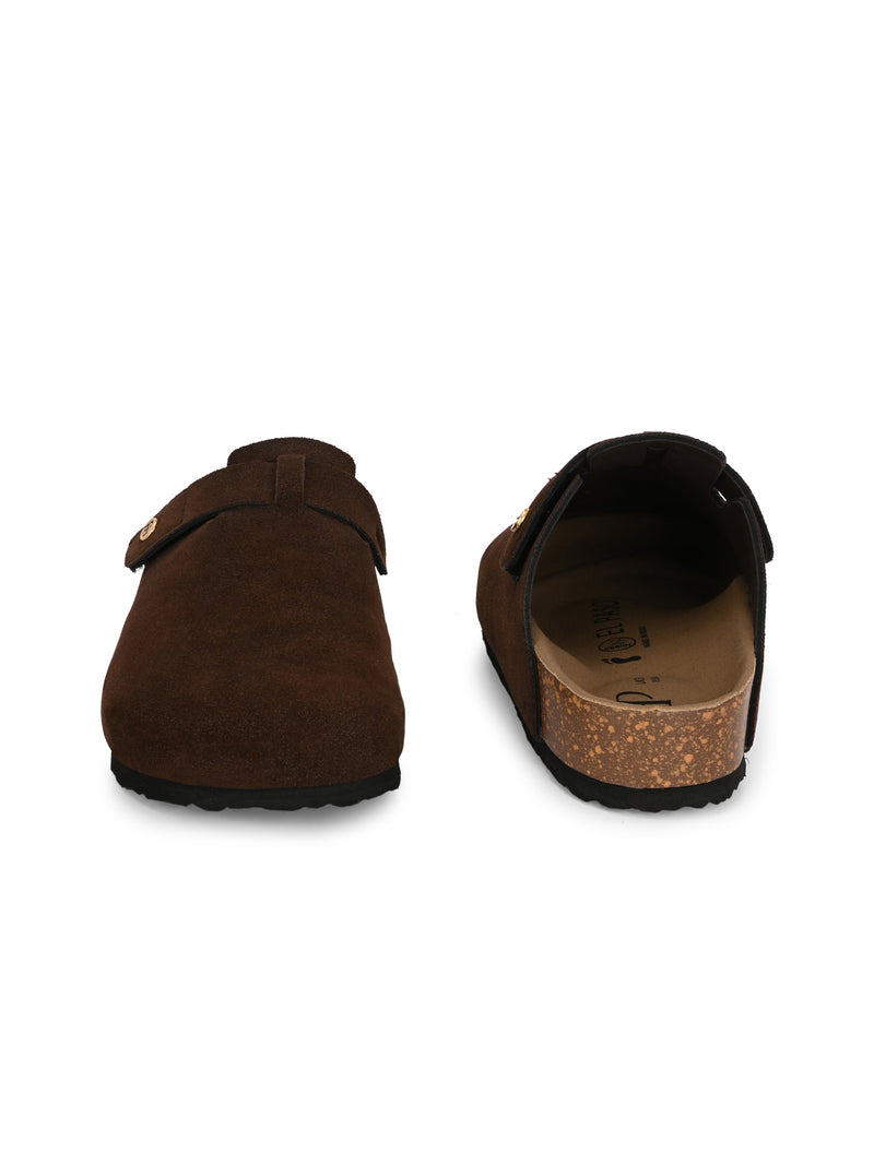 Brown suede slip-on clog with a black rubber sole and adjustable strap.