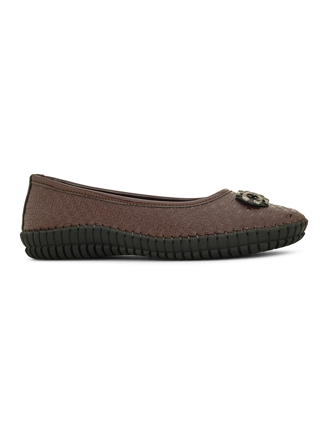A brown woven-texture flat shoe with a round metal ornament on the toe and a black rubber sole.